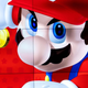 Pictured is Mario on a screen with gold coins at the Nintendo Store in Tokyo.